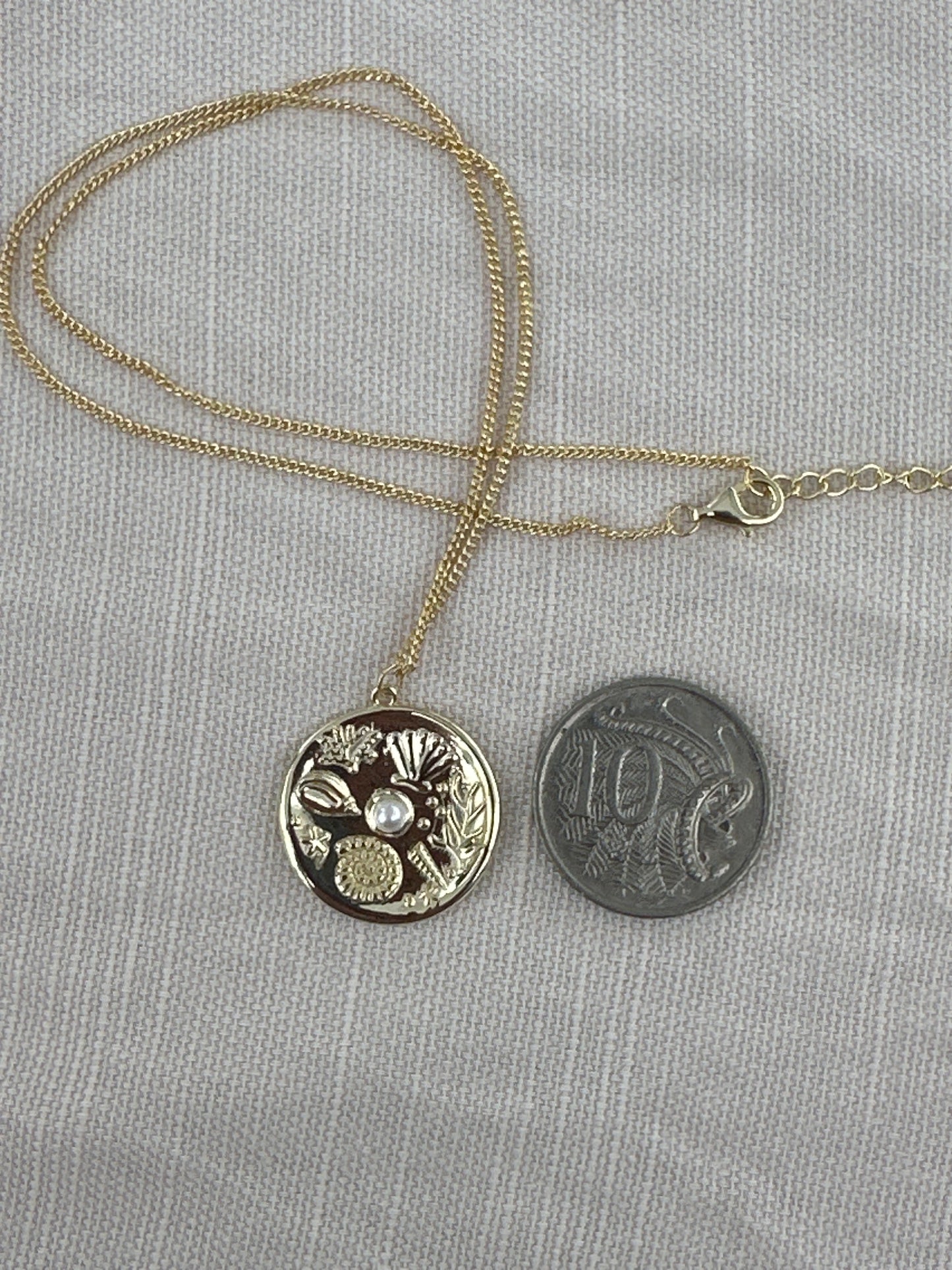 Gold coin ocean necklace